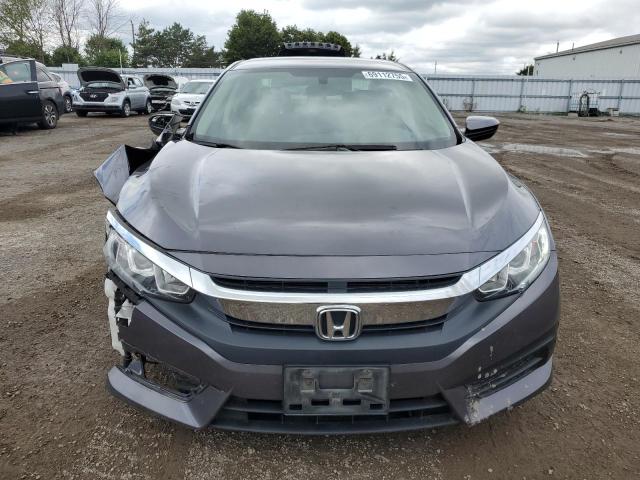 Photo 5 from auction – 2017 HONDA CIVIC LX with VIN 2HGFC2F57HH035045