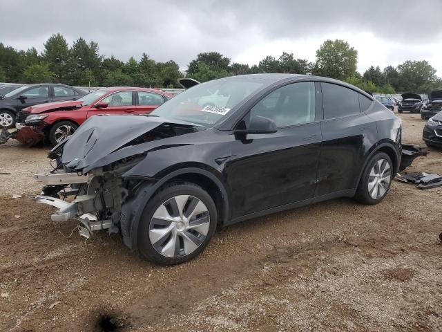 TESLA MODEL Y 2023 with VIN 7SAYGAEE4PF857946 - Photo from auction