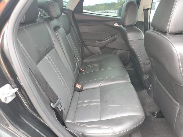 Photo 10 from auction – 2014 FORD FOCUS TITA with VIN 1FADP3J22EL346206