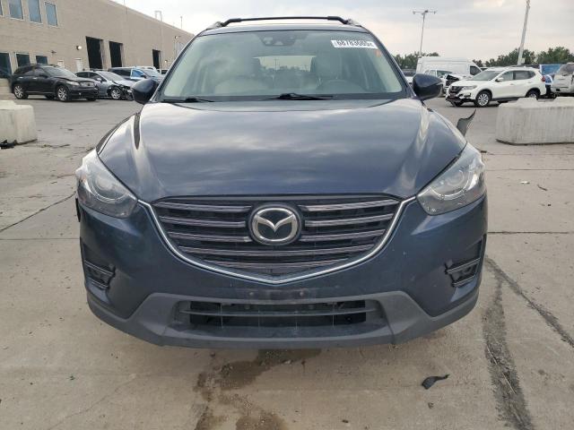 Photo 5 from auction – 2016 MAZDA CX-5 GT with VIN JM3KE4DY5G0680545