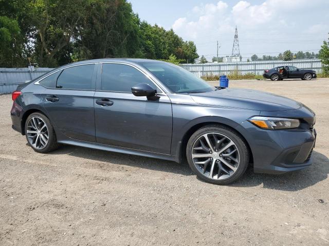 Photo 4 from auction – 2024 HONDA CIVIC TOUR with VIN 2HGFE1F91RH001059