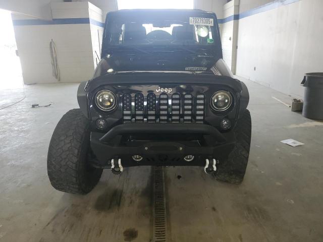 Photo 5 from auction – 2014 JEEP WRANGLER U with VIN 1C4BJWDG3EL102799