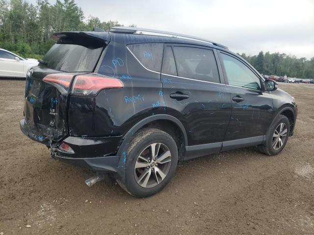 Photo 3 from auction – 2018 TOYOTA RAV4 LE with VIN 2T3BFREV3JW811711