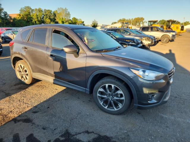 Photo 4 from auction – 2016 MAZDA CX-5 GT with VIN JM3KE4DY1G0884842