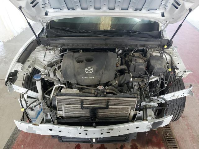 Photo 12 from auction – 2023 MAZDA CX-50 SELE with VIN 7MMVABAM8PN108153