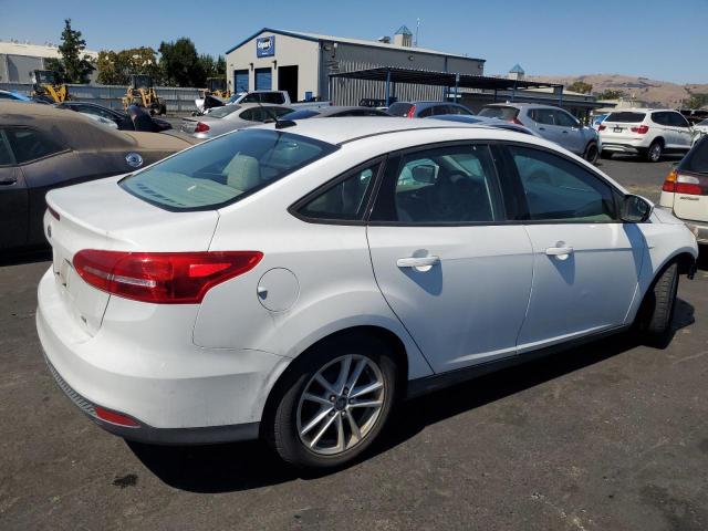 Photo 3 from auction – 2018 FORD FOCUS SE with VIN 1FADP3F24JL237474