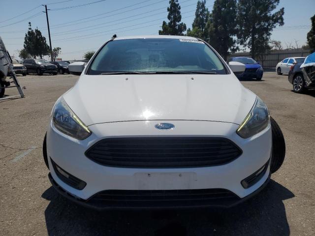 Photo 5 from auction – 2018 FORD FOCUS SE with VIN 1FADP3FE5JL244749