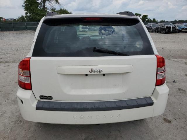 Photo 6 from auction – 2010 JEEP COMPASS SP with VIN 1J4NT4FB8AD562164