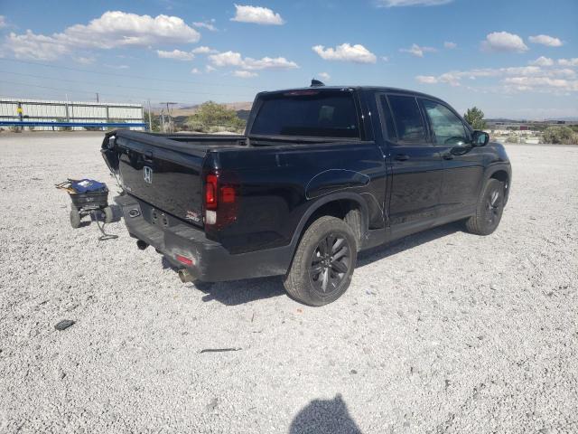 Photo 3 from auction – 2023 HONDA RIDGELINE with VIN 5FPYK3F12PB049170