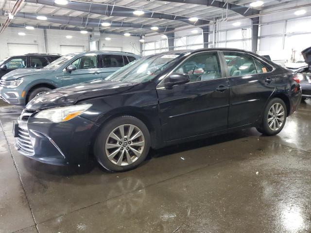 TOYOTA CAMRY LE 2015 with VIN 4T1BF1FK5FU975869 - Photo from auction
