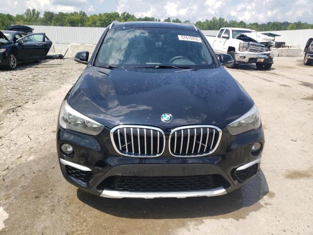 Photo 5 from auction – 2016 BMW X1 XDRIVE2 with VIN WBXHT3C3XG5E56303
