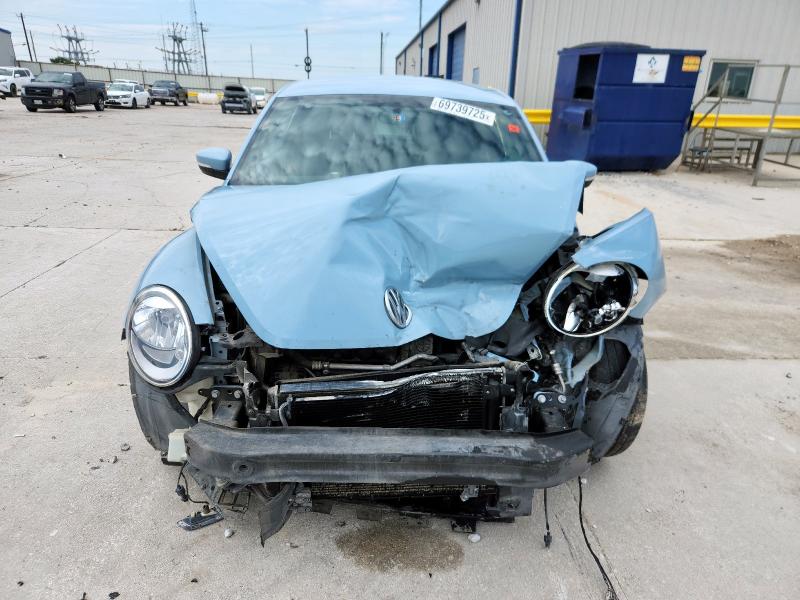 Photo 5 from auction – 2013 VOLKSWAGEN BEETLE with VIN 3VWJX7AT8DM676732