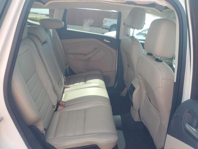 Photo 11 from auction – 2017 FORD ESCAPE TIT with VIN 1FMCU0J93HUB96532