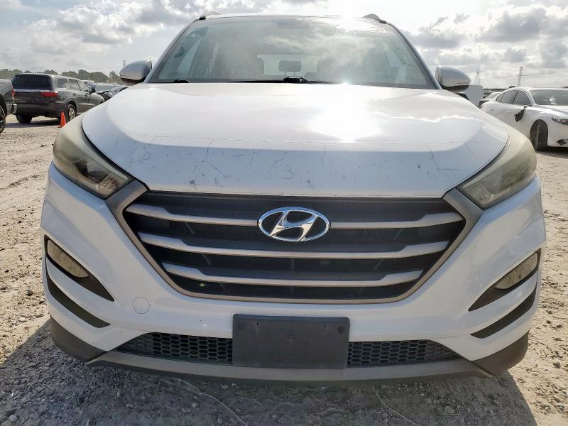 Photo 5 from auction – 2016 HYUNDAI TUCSON LIM with VIN KM8J33A21GU161016