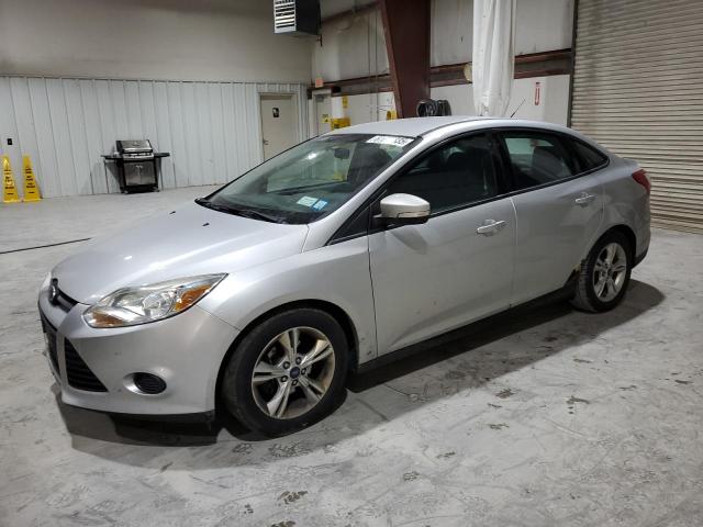 FORD FOCUS 2014 with VIN 1FADP3F2XEL128376 - Photo from auction