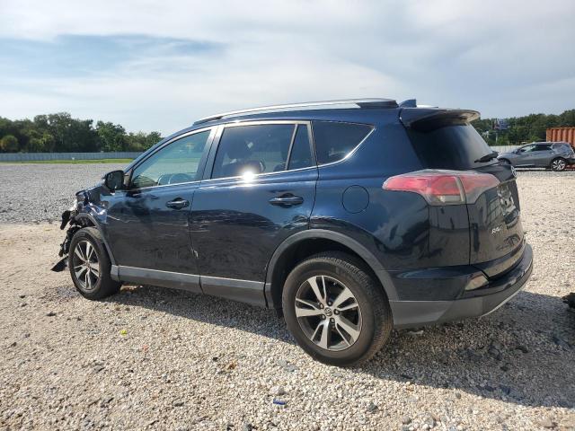 Photo 2 from auction – 2017 TOYOTA RAV4 XLE with VIN JTMWFREV4HD093644