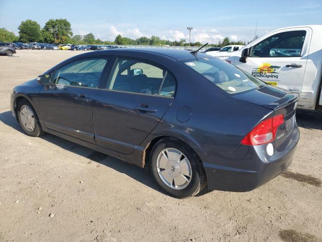 Photo 2 from auction – 2006 HONDA CIVIC HYBR with VIN JHMFA36286S030232
