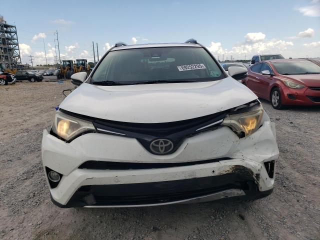 Photo 5 from auction – 2016 TOYOTA RAV4 XLE with VIN JTMWFREV6GJ069071