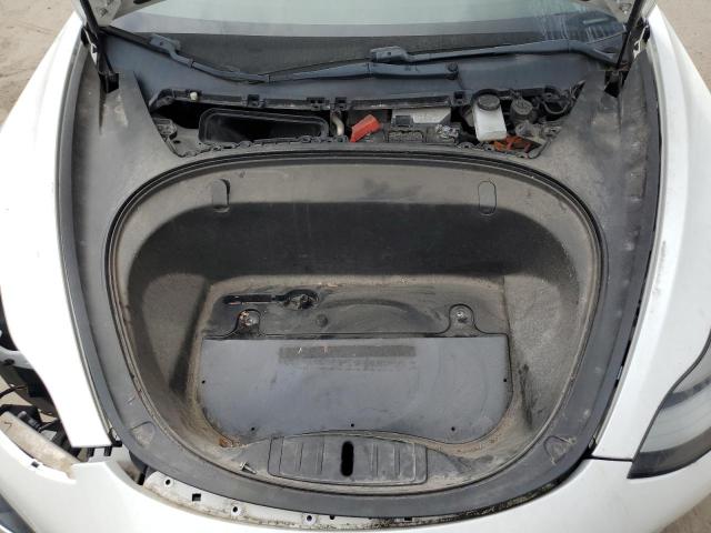 Photo 11 from auction – 2018 TESLA MODEL 3 with VIN 5YJ3E1EA8JF004354