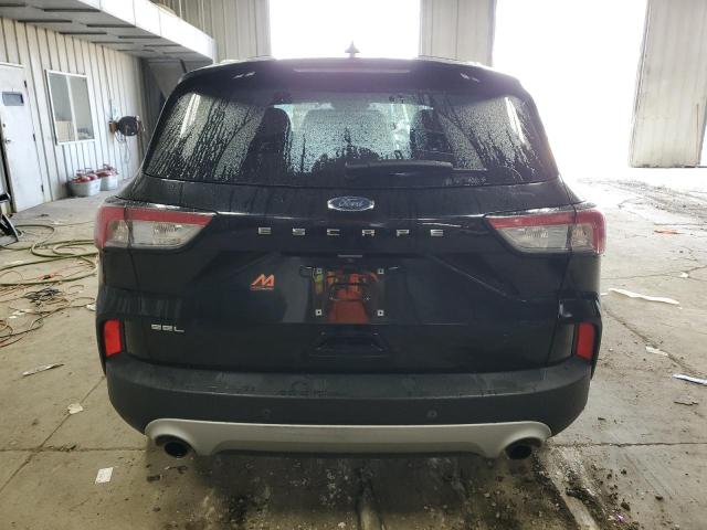 Photo 6 from auction – 2021 FORD ESCAPE with VIN 1FMCU0H61MUA64410