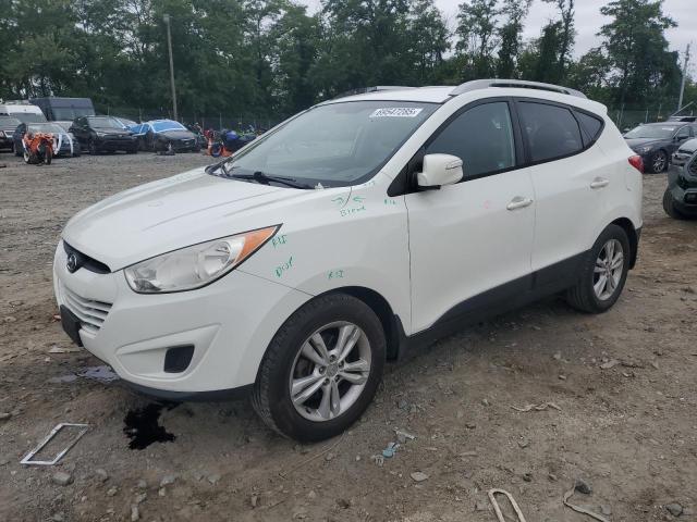 HYUNDAI TUCSON GLS 2012 with VIN KM8JUCAC5CU373403 - Photo from auction