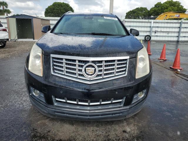 Photo 5 from auction – 2013 CADILLAC SRX PERFOR with VIN 3GYFNDE34DS650867