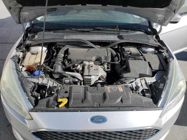 Photo 11 from auction – 2015 FORD FOCUS SE with VIN 1FADP3FE2FL314490