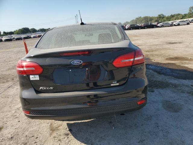 Photo 6 from auction – 2018 FORD FOCUS SE with VIN 1FADP3FEXJL201413
