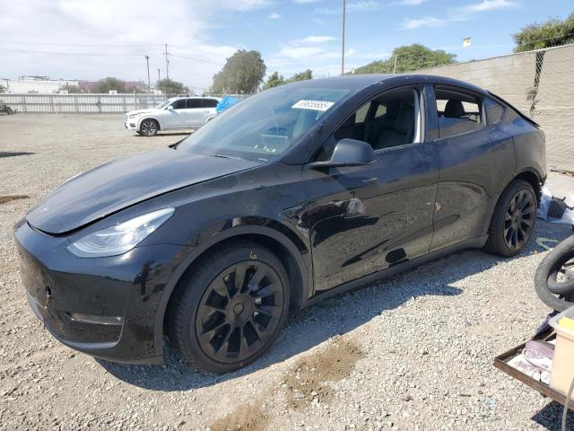 TESLA MODEL Y 2022 with VIN 7SAYGAEEXNF390934 - Photo from auction