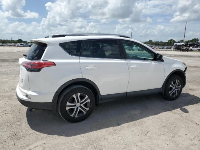 Photo 3 from auction – 2018 TOYOTA RAV4 LE with VIN 2T3BFREV6JW770975