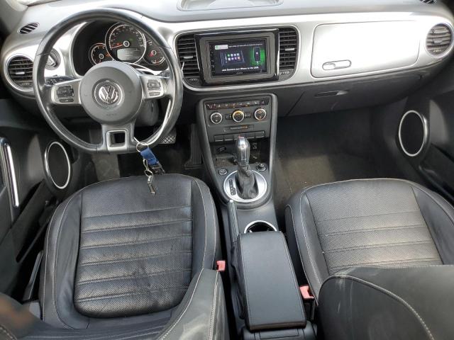 Photo 8 from auction – 2014 VOLKSWAGEN BEETLE with VIN 3VWJL7AT4EM656653
