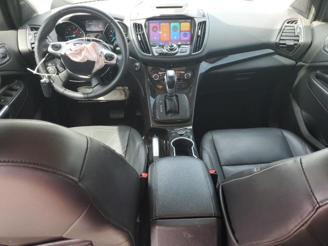 Photo 8 from auction – 2016 FORD ESCAPE TITANIUM with VIN 1FMCU0JX7GUC65784