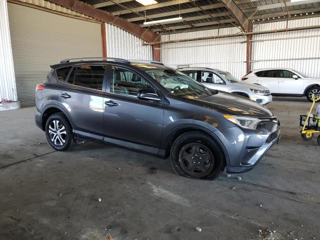 Photo 4 from auction – 2018 TOYOTA RAV4 LE with VIN 2T3ZFREV0JW433202