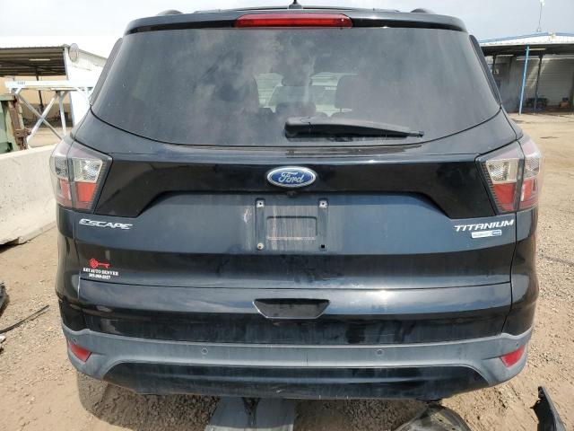 Photo 6 from auction – 2017 FORD ESCAPE TITANIUM with VIN 1FMCU9JD1HUA69903