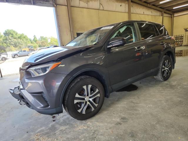 TOYOTA RAV4 LE 2018 with VIN 2T3BFREV3JW852436 - Photo from auction
