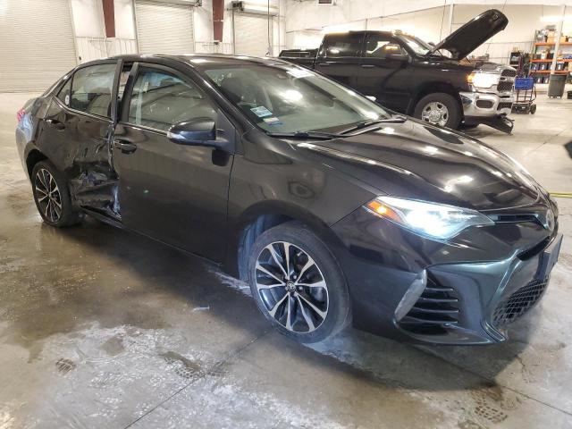 Photo 4 from auction – 2018 TOYOTA COROLLA SE with VIN 5YFBURHEXJP832504