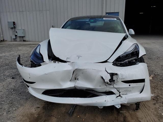 Photo 5 from auction – 2021 TESLA MODEL 3 with VIN 5YJ3E1EB0MF915033