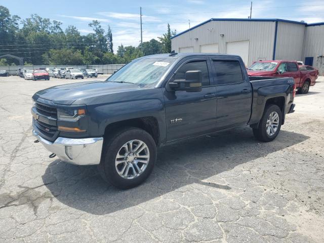 CHEVROLET SILVERADO 2018 with VIN 3GCUKREC7JG185664 - Photo from auction
