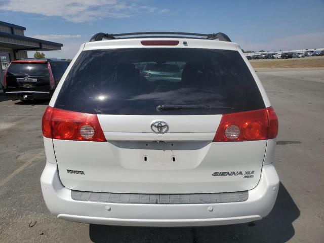 Photo 6 from auction – 2009 TOYOTA SIENNA XLE with VIN 5TDBK22C79S025302