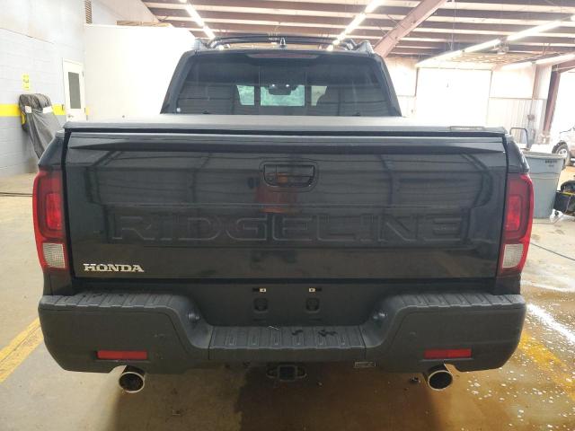 Photo 6 from auction – 2025 HONDA RIDGELINE with VIN 5FPYK3F81SB037176