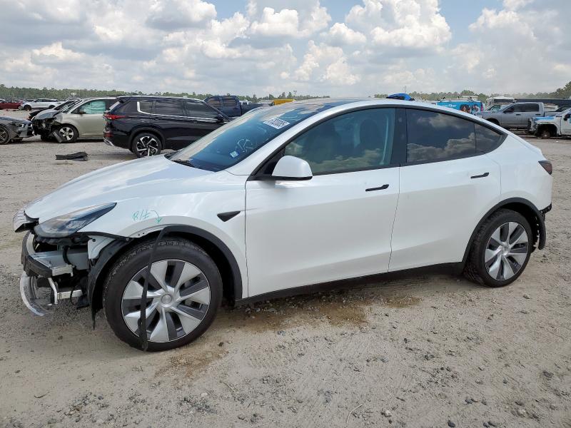 TESLA MODEL Y 2023 with VIN 7SAYGDEE8PA120148 - Photo from auction