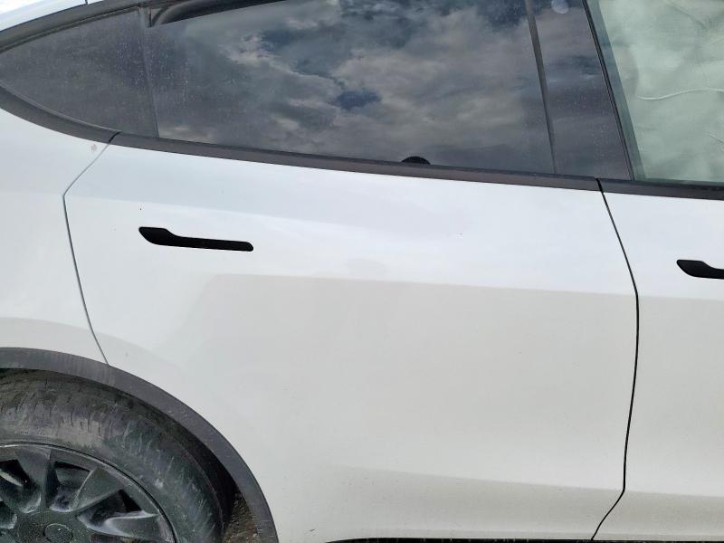 Photo 10 from auction – 2023 TESLA MODEL Y with VIN 7SAYGDEE7PA094304