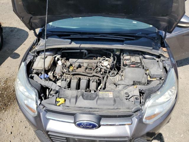 Photo 11 from auction – 2014 FORD FOCUS SE with VIN 1FADP3F27EL151937