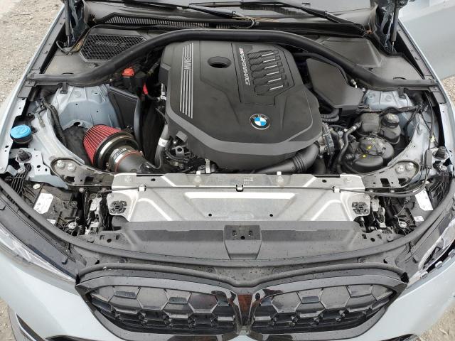 Photo 11 from auction – 2023 BMW M340XI with VIN 3MW49FF09P8C98739