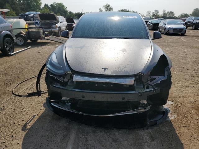 Photo 5 from auction – 2022 TESLA MODEL Y with VIN 7SAYGDEF3NF551022