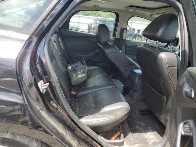 Photo 10 from auction – 2013 FORD FOCUS TITA with VIN 1FADP3J23DL295099