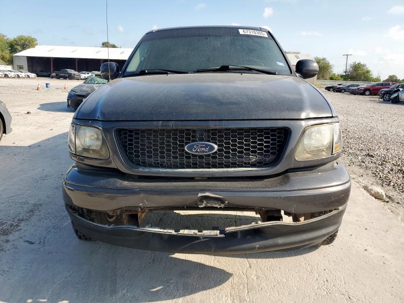 Photo 5 from auction – 2003 FORD F150 SUPER with VIN 1FTRW07643KC60779