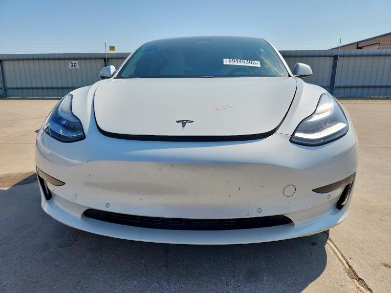 Photo 5 from auction – 2018 TESLA MODEL 3 with VIN 5YJ3E1EB1JF112307