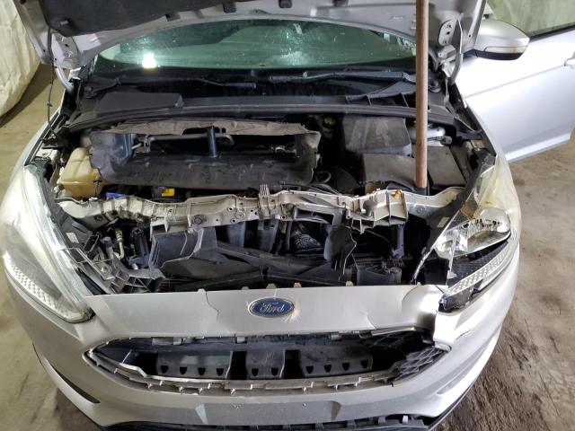 Photo 11 from auction – 2016 FORD FOCUS SE with VIN 1FADP3F27GL320776