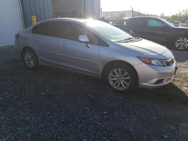 Photo 4 from auction – 2012 HONDA CIVIC LX with VIN 2HGFB2F50CH011228